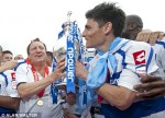 Warnock e Faurlin sollevano la coppa di vincitori della Championship